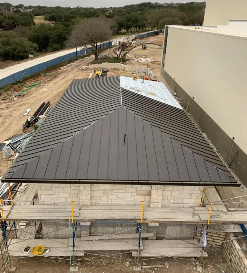 Metal roof new construction with scaffolding in Beekman